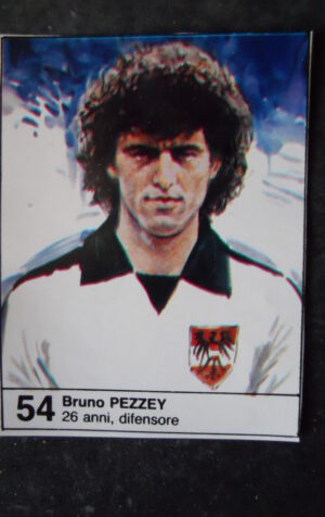 FIGURINA ALBUM MUNDIAL 1982 ESPANA GIORNALINO #54 AUSTRIA BRUNO PEZZEY [AF3]